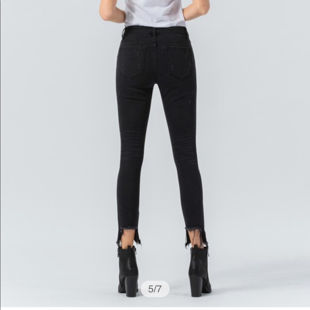 Midrise distressed shark bite skinny black jean - Picture 4 of 7